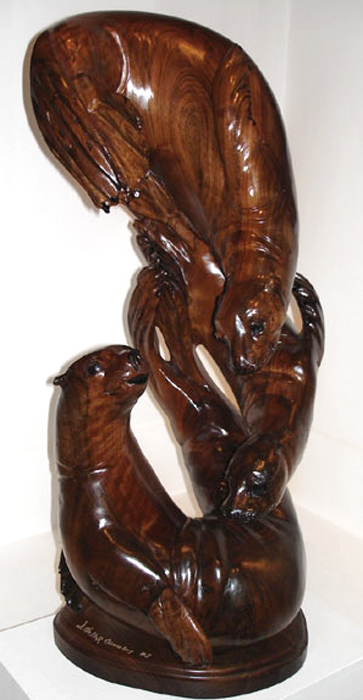 Dance of Oceans  32” tall x 14” wide x 15” deep, solid hand-carved black walnut